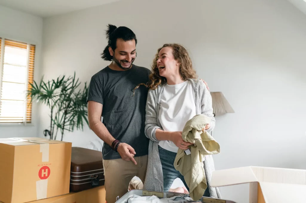 Happy homeowners who just moved into a Lease Purchase home