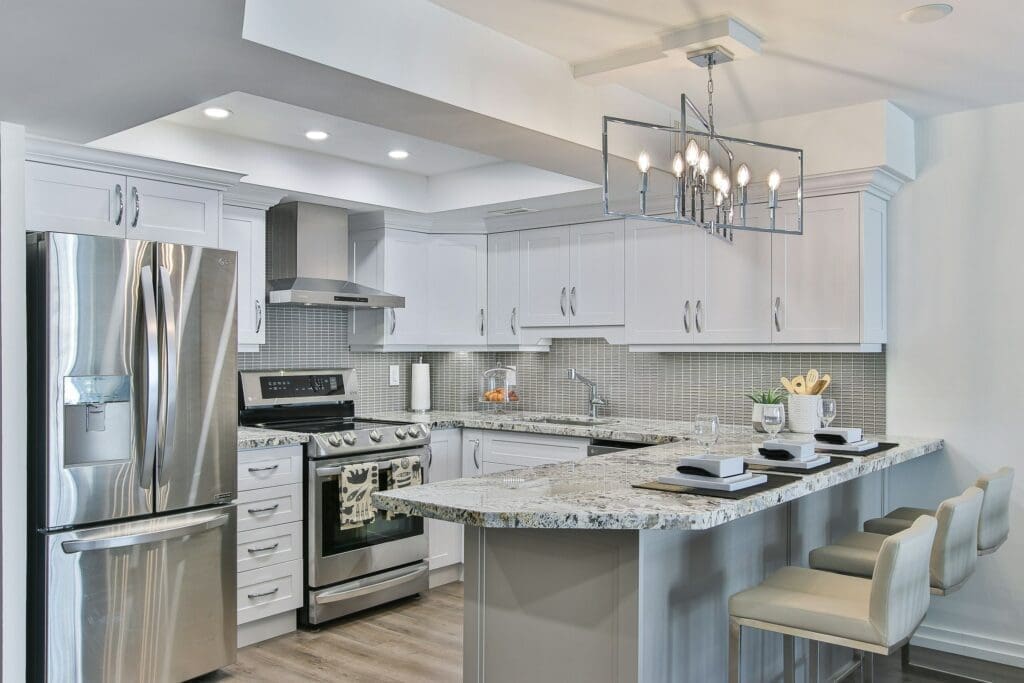 Beautifully appointed modern kitchen and dining space with neutral tones and modern finishes, ideal for families exploring lease to own Raleigh as a flexible path to homeownership.